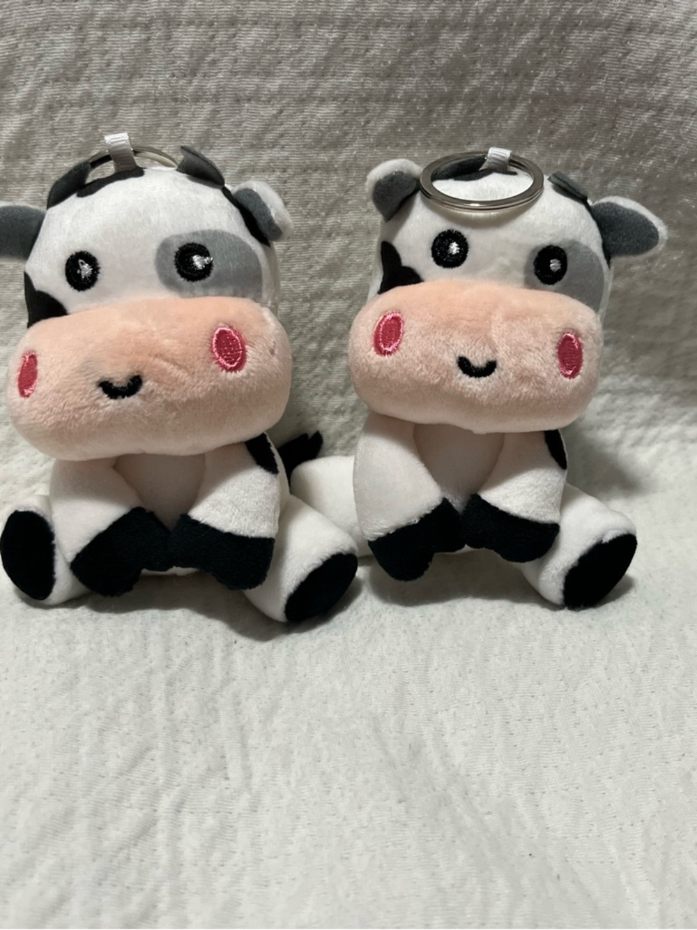Plush Cow Keychain Duo - White, Black & Pink Accents